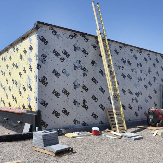 3M 3015NP vapour barrier installed on exterior wall – peel-and-stick application without primer